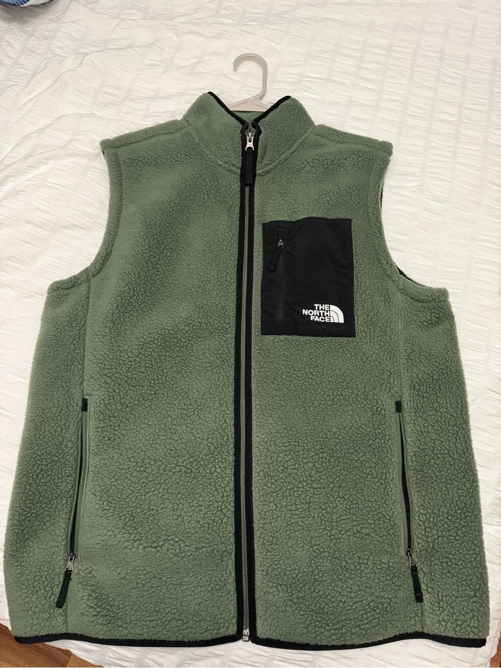 The North Face Men’s Olive Green Sherpa Fleece Vest with Black Chest Pocket